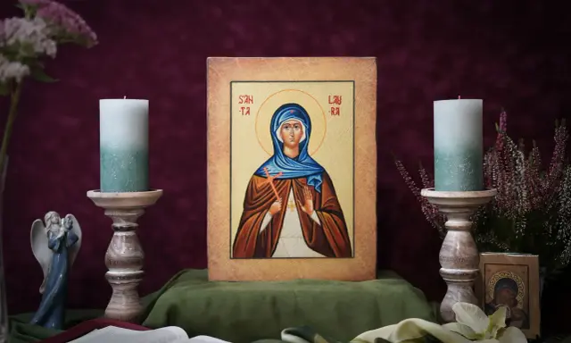 Ikona błogosławionej Jolanty z krzyżem i świecami.