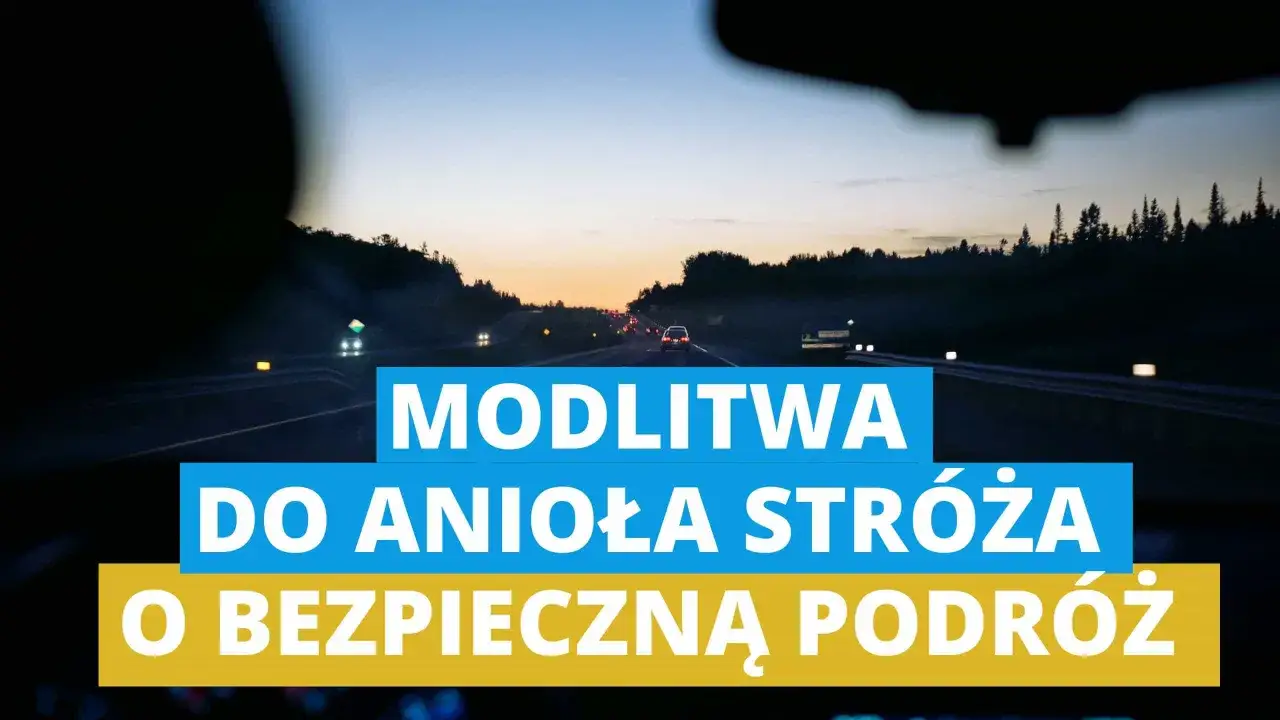 Droga nocą, światła samochodów i napis